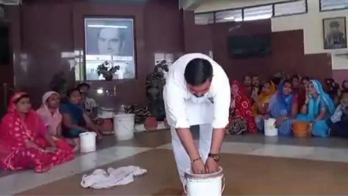 Asarwa Residents Wash Hands at AMC office in Unique Protest Over Unconnected Water Pipeline